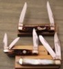 Frontier Muskrat and two Rough Riders