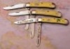 Trio of Case Yellow Trappers
