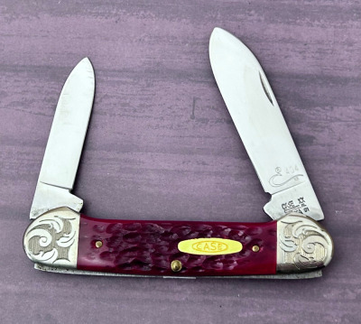 Case Engraved Dark Red Bone Canoe