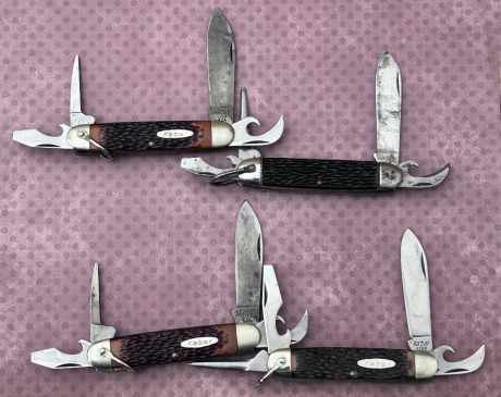 Three Kabar Scouts and One Camco Scout