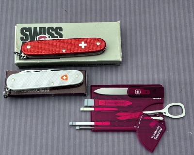 Two Swiss Army knives and one Swiss Card