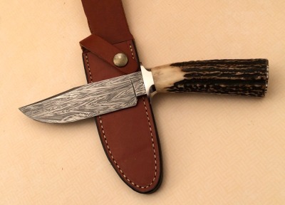 Roberto Feather Damascus Hunter