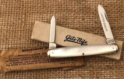 Vintage etched Montgomery Ward Pearl Pen in paper