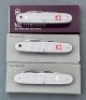 Three Victorinox Swiss Army Knives