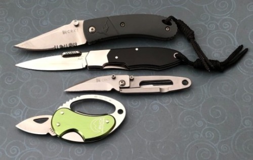 Two CRKT, One Solo, P.E.C.K. and Buck Whittaker