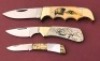 Three Kershaw Scrimmed or Engraved Lockbacks
