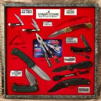 Schrade Cutlery Display With 9 knives and a keychain