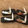 Four Browning Pearl or Wood Lockbacks