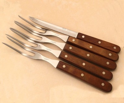 Four Case Carving Forks and a Boning Knife