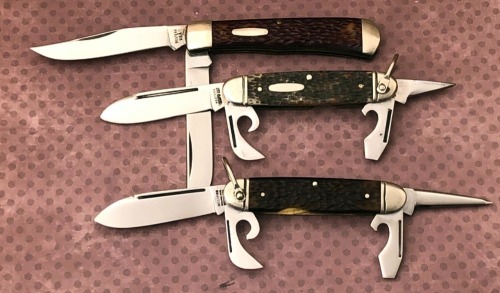 Three Western Folders, Two Scouts and a Trapper