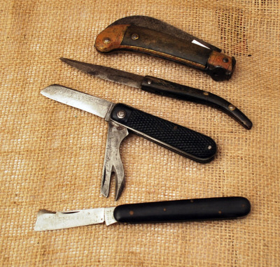 Four Used Knives
