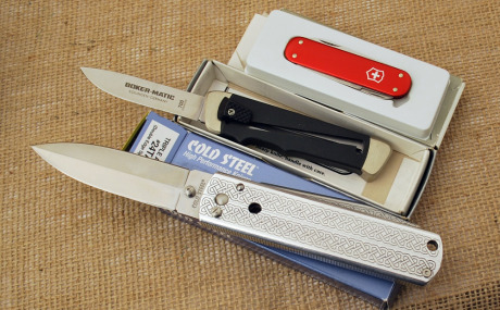 Three knives: Victorinox, BokerMatic, and Cold Steel