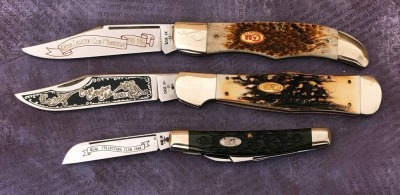 Three Case Collectors Club, 1984 Congress, 1985 Coke bottle Folding Hunter, and a 1986 Folding Hunter