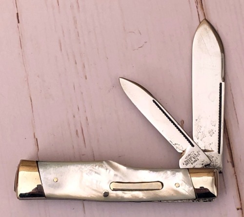 J Russell rehandled Pearl Gunstock
