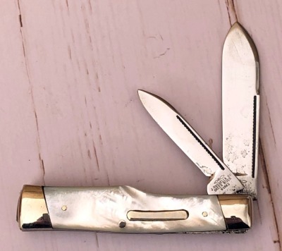 J Russell rehandled Pearl Gunstock