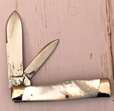 J Russell rehandled Pearl Gunstock - 2