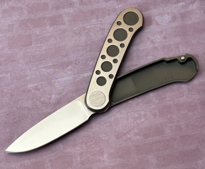 Barry Wood Metal Rotating Folder