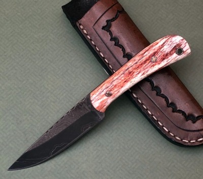 Rocky Thomas Damascus Hunter