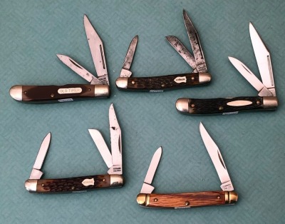 Four Schrade USA and one Ulster USA