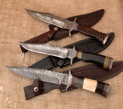 Three Damascus Impact Custom Knives