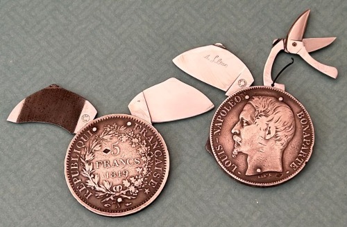 Eloi Pernet knives in 5 Franc coins.