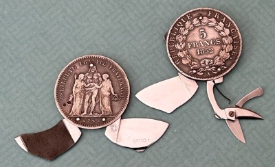 Eloi Pernet knives in 5 Franc coins. - 2