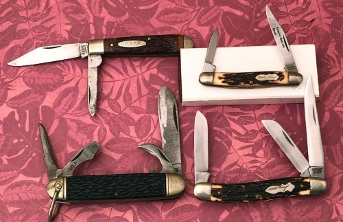 Four Folders; Two Schrade USA, One Kabar, & one Camco