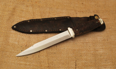 Case Sticking Knife in Original Sheath.