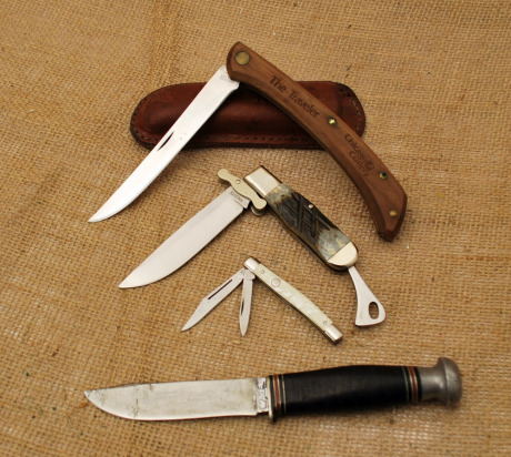 Four knives including Case Tested Hunter