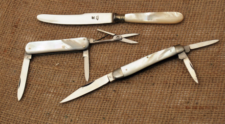 Three pearl handled Henckels knives