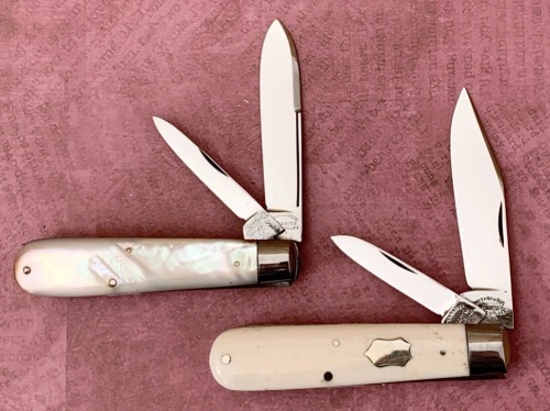 Pair of Cattaraugus Exhibition Pearl and Bone Jacks