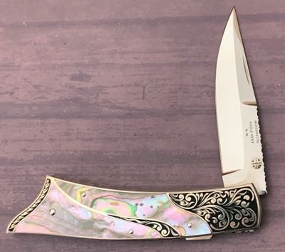 Harvey McBurnettte Engraved Abalone Lockback