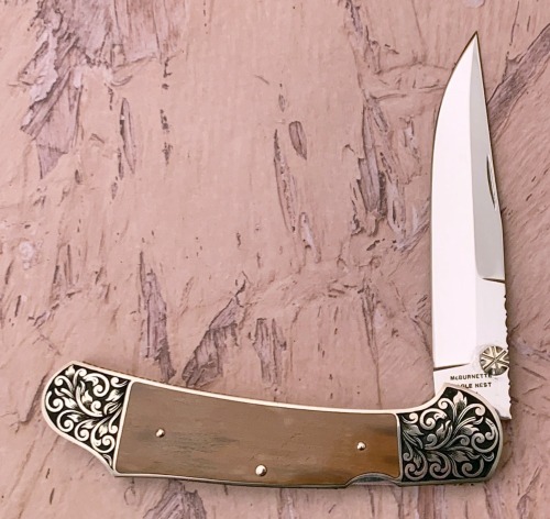 Harvey McBurnettte Engraved Mammoth Lockback