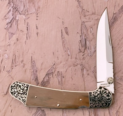 Harvey McBurnettte Engraved Mammoth Lockback