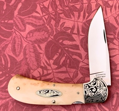 Harvey McBurnettte Engraved Bone Lockback