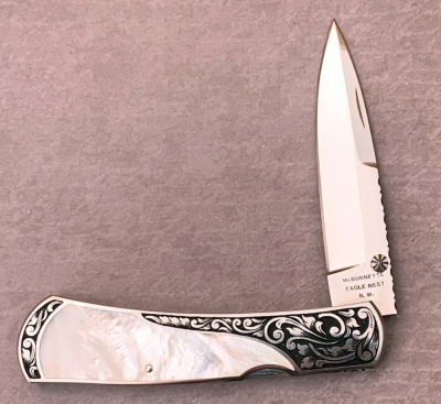 Harvey McBurnettte Engraved Pearl Lockback